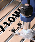 Genmitsu 710W CNC compact router spindle with LCD display mounted on blue Z-axis over aluminum T-slot milling table.