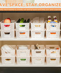 Ten Pack Small Plastic Storage Bins With Lids Stackable Baskets With Handles For Easy Carry Awesome For Pantry Craft Room Office Or Garage Organization Includes Label Cards For Quick Sorting And Clear View shown in cabinetry use