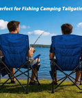 Two people seated on Heavy Duty Camping Chairs 2 Pack With 500 Lbs Capacity, Folding Lawn Chairs With Wide Seat by a lake.