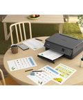 Wireless All In One Color Printer With Crisp Oled Touchscreen Display And Instant Wifi Access in a home office setting.