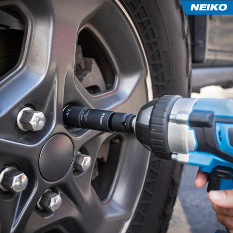 Torque Limiting Extension Bar And Deep Impact Metric Socket Set Half Inch Drive CrMo Beefy 8 Piece in use on car wheel