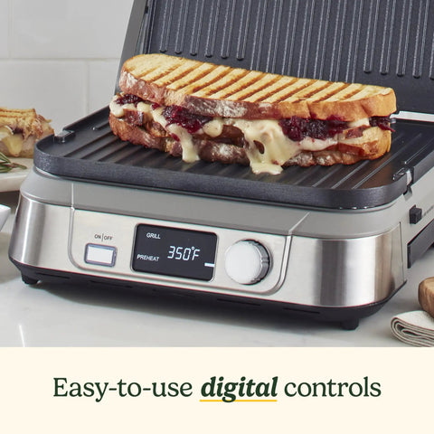 Cuisinart Griddler FIVE Electric Grill With Panini Press with sandwich on grill and digital control display at 350°F.