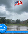 20 Ft Aluminum Flag Pole Kit With Black Ball Topper And 3x5 Embroidered US Flag in rain, showcasing weatherproof construction