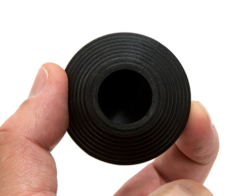 Hand holding Universal Drain Stopper For Bathtub And Sink Your Go To Two Pack Black Plug Fits Most Drains Easy To Use Reusable