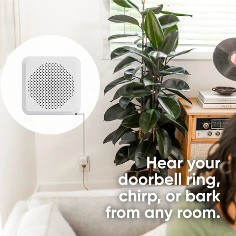 White wireless speaker on wall near plant; Keyless Entry Smart Door Lock With WiFi And Bluetooth, Lock Or Unlock From Your Phone featured