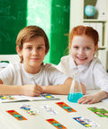 Children in a classroom with Color Your Own Science Bookmarks Set For Kids Kid Approved 72 Pcs DIY Chemistry Lab Astronaut Themed Coloring Bookmarks.
