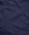Close-up of pocket detail on Mens Heavy Duty Mechanic Lab Coat With Reflective Safety Strips Breathable Navy Workshop Uniform.
