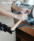 BG-GRIND4 four-piece sharpening jig installed on a bench grinder for wood chisels and turning tools