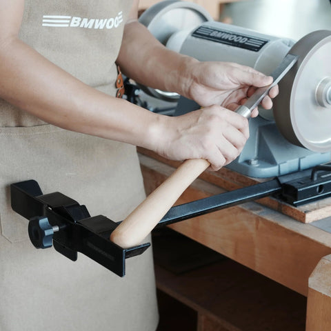 BG-GRIND4 four-piece sharpening jig installed on a bench grinder for wood chisels and turning tools