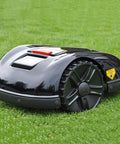 Smart Automatic Robotic Lawn Mower With Self Charging And Rain Avoidance, Lift And Tilt Safety Sensors, black model on grass