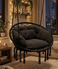 Cozy Cushion Hanging Hammock Chair With Extra Support For Indoor And Outdoor Hangout Macrame Swing Chair For Porch Or Backyard 350 Lb Capacity Black Everyday Use in a cozy living room setting with candles.