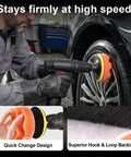 A person using the All In One Pro Grade 33 Piece 4 Inch Car Polishing Pad Kit With Foam Wave And Flat Pads Wool Buffers Backing Plates And Drill Adapters on a car wheel.