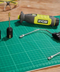 4V Cordless Hot Foam Cutter With 2.0Ah Battery Killer Cuts For Model Making And Crafts with various wire tips on a cutting mat.