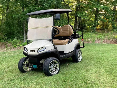 Club Car Tempo golf cart featuring Deluxe RGB LED Light Kit For Club Car Tempo Golf Carts With Daytime Running Light Easy Install Full Exterior Lighting Solution For Safer Style Forward Cruisin With RGB Lights on grass.