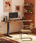 Huuger 47 X 24 Inch Height Adjustable Electric Standing Desk In Rustic Brown with computer and decor in a home office setting.