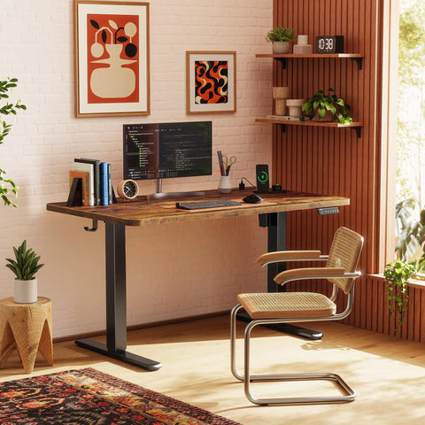 Huuger 47 X 24 Inch Height Adjustable Electric Standing Desk In Rustic Brown with computer and decor in a home office setting.