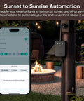 Outdoor Smart Plug With Dual Outlets And Energy Monitoring, Weatherproof IP64, 2.4GHz WiFi, No Hub Needed, Works With Alexa, Google Assistant, And IFTTT, Black For Outdoor Use shown beside smartphone displaying automation app in outdoor setting.