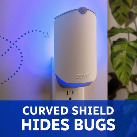 Plug In Bug Zapper For Straight Up Home Pest Control Killer Against Fruit Flies And Those Dang Gnats With Uv Light And No Mess Adhesive Cartridge Indoor Fly Traps 3 Refill Pack mounted on wall with blue light.