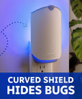 Plug In Flying Insect Trap For Fruit Flies And Gnats Using Blue And Uv Light With Zero Mess Adhesive Cartridge mounted on a wall.