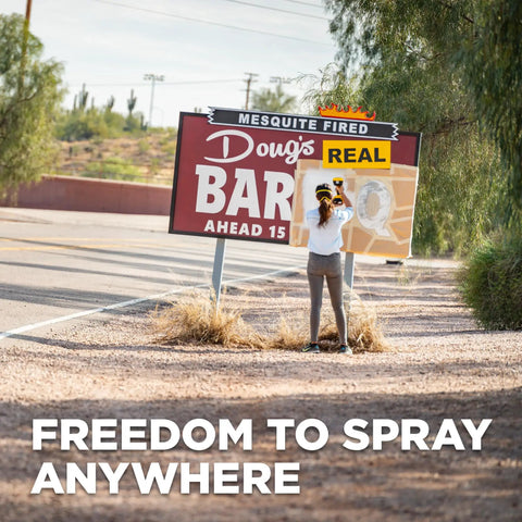 Person using 18V Cordless Paint And Stain Sprayer Delivering Slick HVLP Coatings on a roadside sign.