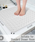 Total Bath Upgrade Slick Non Slip Shower Mat With Rock Solid Suction Cups And Quick Drain Holes For Fast Drying Soft Machine Washable Bathroom Floor Rug Clear Square Design, 21x21 inch, used in shower.