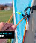 CamJam SlideLock Bungee Cord Tightener With Pull To Tighten Lock And Quick Release Lever in use on outdoor gear
