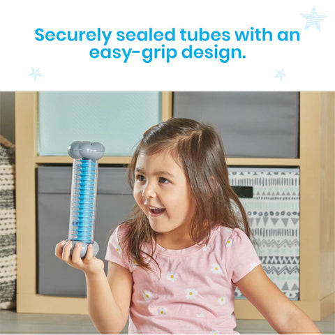Young girl holding Calming Rain Sensory Tubes For Kids, Chill Rain Sound Fidget Toys, Rain Stick Instrument in playroom.
