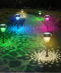 8 Pack Solar Pathway Lights With Warm White And 7 Color Changing Modes illuminating a garden walkway