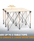 Centipede CT9 36 Inch Tall Quick Setup Portable Folding Workbench With Carry Strap, Collapsible Construction Table And Sawhorse, 4 Ft By 4 Ft, 3500 Lb Weight Capacity, Orange shown with extended legs and perforated top.