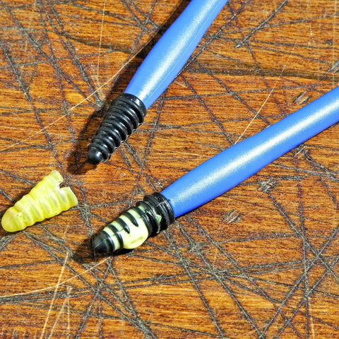 Silicone Mini Glue Brush 2-Pack for Woodworking and DIY Crafts with flexible silicone tips on a wooden surface.
