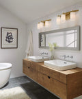 Bathroom with Alturas Three Light Vanity Fixture For Wall And Bath In Satin Brass Sleek 22 Inch Wide 9.1 Inch Tall Steel Construction