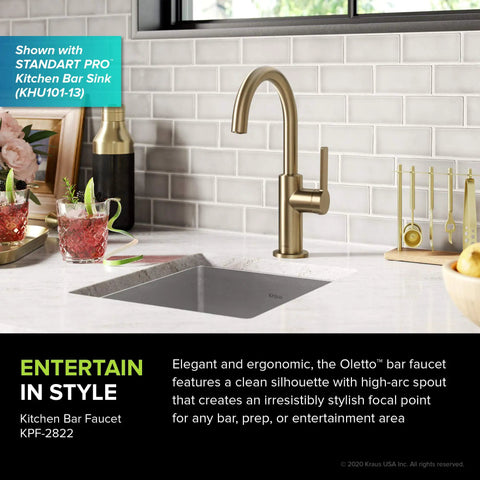 Oletto Single Handle Kitchen Bar Faucet In Spot Free Antique Champagne Bronze With 12 Inch Tall Body, Six And One Half Inch Spout Reach, 1.8 GPM Flow, Fingerprint Resistant Finish For A Clean Modern Vibe installed on white countertop