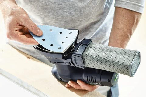Person attaching P80 Grit Granat Abrasive Sheet to DTS 400 Sander, highlighting anti-clog design with smooth finishes capability.