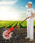 Man using Metal Precision Garden Seeder With 10 Hole Walk Behind Planter And Clear Seed Storage Box in a farm field