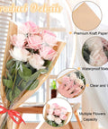 Bouquet wrapped in 40 Pack Kraft Paper Flower Wrapping Bags And Sleeves For Bouquets, clear front shows pink roses, bow tie