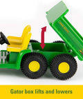 1 To 64 Scale Die Cast Farm Toy Playset With 70 Pieces Including Tractors Trucks Farm Animals Tools A Farm Shed And More For Kids 8 And Up Realistic Details Durable Build And Epic Creative Farm Fun includes a detailed green toy tractor with a lifting gator box.