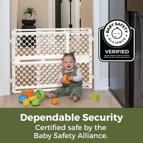 Recycled Plastic Baby Gate Pressure Mounted Doorway Safety Barrier Indoor Outdoor Use No Hassle Setup, with a baby playing behind it.
