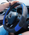 Slick Microfiber Leather Steering Wheel Cover Universal 14.5 To 15 Inch Anti Slip Padded Grip For Cars Trucks And Suv With Stylish Black Blue Stitching For Bone Comfy Drives on a steering wheel.