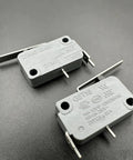Two G5T16 Normally Open Micro Switches With Lever, 2 Pin, 16A 125 to 250V AC, showcasing silver contacts and heavy duty design.