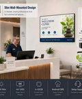 Heavy Duty 65 Inch Wall Mounted Digital Signage Display 4K Menu Board Indoor Commercial Business Advertising Screen Built Tough Bright Promotional Monitor With No Sweat Setup in a modern clinic lobby.