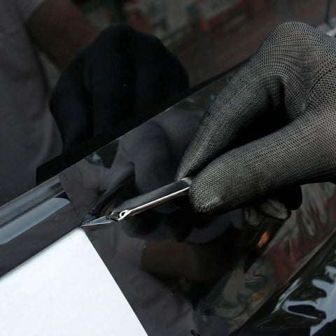 Person using vinyl cutter with All-In-One Vinyl Wrap Heat Gun Kit For Cars And Window Tinting, 1800W 110V Hot Air Tool