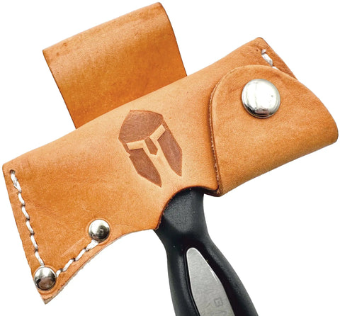 Close-up of Five In One Survival Hatchet Head in leather sheath, carbon steel tool visible, for real world field tasks.