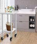 Pro Grade Stainless Steel Commercial Work Table With Wheels For Kitchens And Labs, 24x24 Inch Prep And Work Surface in a home setting
