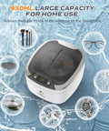 Image of Ultrasonic Jewelry Cleaner 850ml With LCD Screen And 5 Digital Timers, surrounded by watches, glasses, and CDs.