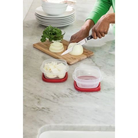 Easy Find Lids Food Storage Containers 1.25 Cup Set In Racer Red, 4 Piece Nesting Storage Set on countertop with chopped onions