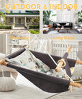 Indoor and outdoor baby swing for infants to toddlers in living room setting with five point safety belt