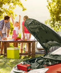 Family using the 2000W Car Power Inverter 12V To 110V AC Converter With 4000 Watt Surge while cooking outdoors.