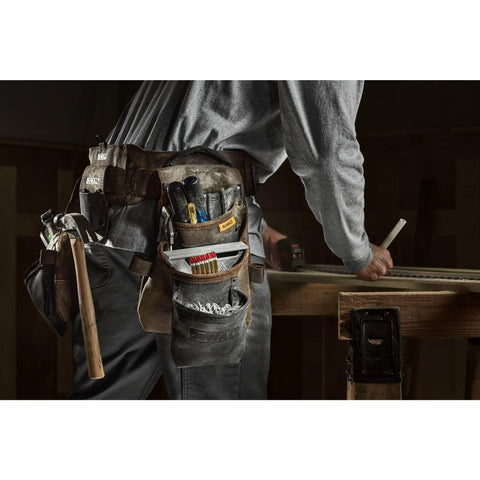Leather Tool Belt Organizer With 18 Pockets For Pros, heavy duty construction shown in use on carpenter at workbench