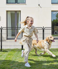 Child and dogs playing in a yard enclosed by Beefy Iron No Dig Garden Fence System With 16 Panels Spanning 34 Point 7 Feet And 40 Inch High Includes 2 Gates Anti Dig Gravity Lock Indoor Outdoor Dog Fence For Yard RV Camping Black