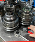 Hand using Pro Grade Internal Master Cylinder Snap Ring Pliers Long Reach 90 Degree Bent Nose on automotive parts